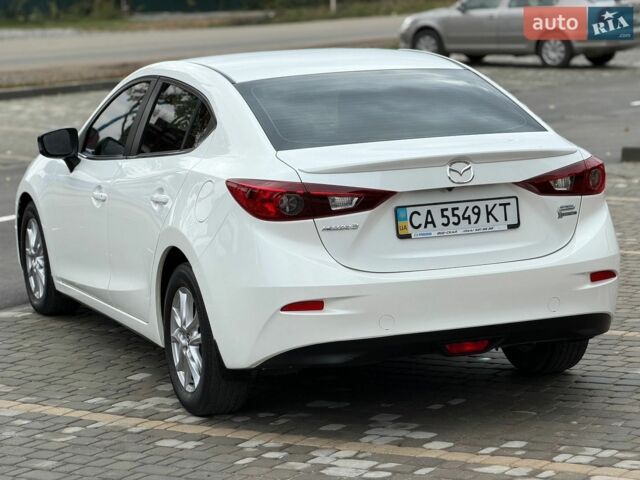 Білий Мазда 3, об'ємом двигуна 1.5 л та пробігом 92 тис. км за 13950 $, фото 12 на Automoto.ua