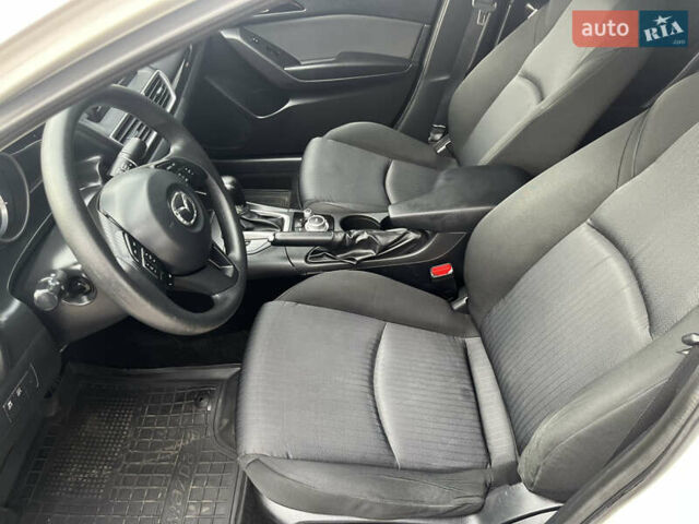 Білий Мазда 3, об'ємом двигуна 2 л та пробігом 175 тис. км за 10700 $, фото 13 на Automoto.ua