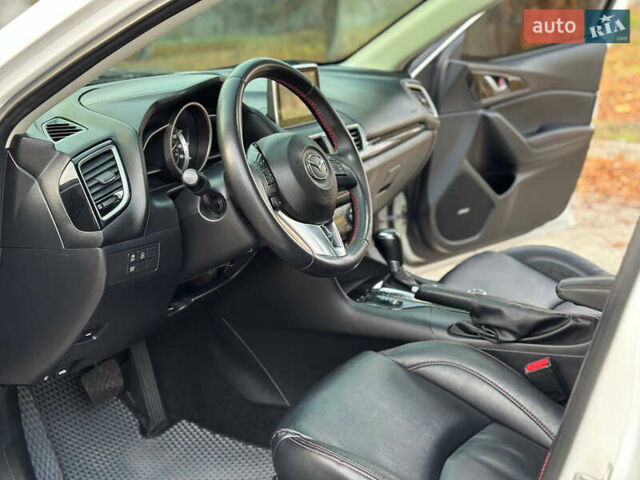 Білий Мазда 3, об'ємом двигуна 2 л та пробігом 276 тис. км за 7999 $, фото 10 на Automoto.ua