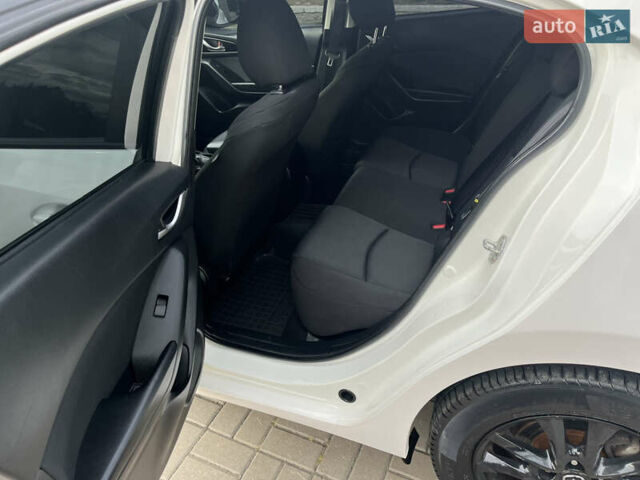 Білий Мазда 3, об'ємом двигуна 2 л та пробігом 175 тис. км за 10700 $, фото 15 на Automoto.ua