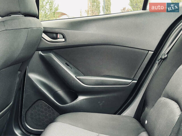Белый Мазда 3, объемом двигателя 2 л и пробегом 208 тыс. км за 8899 $, фото 13 на Automoto.ua
