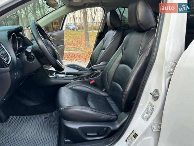 Білий Мазда 3, об'ємом двигуна 2 л та пробігом 276 тис. км за 7999 $, фото 9 на Automoto.ua