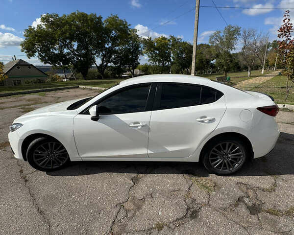 Білий Мазда 3, об'ємом двигуна 2 л та пробігом 185 тис. км за 9500 $, фото 7 на Automoto.ua