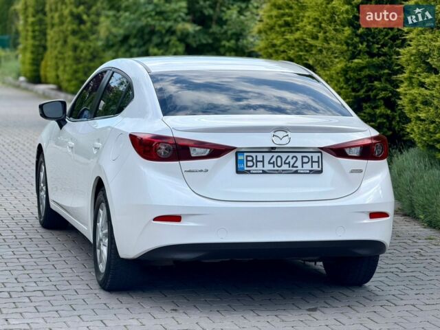 Белый Мазда 3, объемом двигателя 2 л и пробегом 156 тыс. км за 10200 $, фото 16 на Automoto.ua