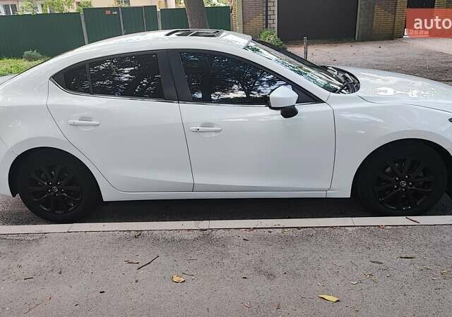 Білий Мазда 3, об'ємом двигуна 2 л та пробігом 157 тис. км за 10200 $, фото 3 на Automoto.ua