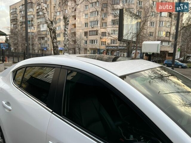 Белый Мазда 3, объемом двигателя 2 л и пробегом 177 тыс. км за 11500 $, фото 5 на Automoto.ua
