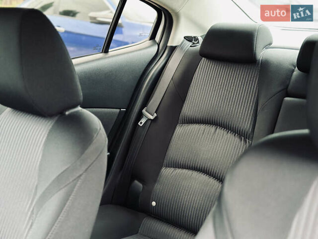 Белый Мазда 3, объемом двигателя 2 л и пробегом 208 тыс. км за 8899 $, фото 44 на Automoto.ua