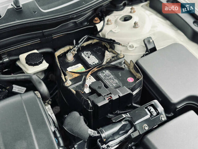 Белый Мазда 3, объемом двигателя 2 л и пробегом 208 тыс. км за 8899 $, фото 21 на Automoto.ua