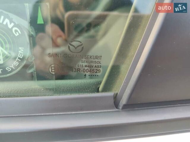 Белый Мазда 3, объемом двигателя 2 л и пробегом 144 тыс. км за 9500 $, фото 30 на Automoto.ua