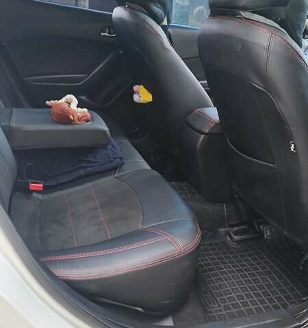 Білий Мазда 3, об'ємом двигуна 2 л та пробігом 157 тис. км за 10200 $, фото 23 на Automoto.ua