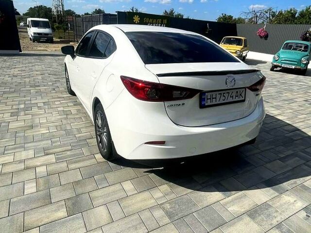 Білий Мазда 3, об'ємом двигуна 2 л та пробігом 182 тис. км за 9600 $, фото 4 на Automoto.ua