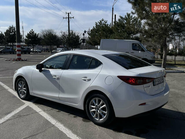 Белый Мазда 3, объемом двигателя 2 л и пробегом 152 тыс. км за 9900 $, фото 6 на Automoto.ua
