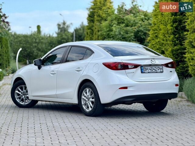 Белый Мазда 3, объемом двигателя 2 л и пробегом 156 тыс. км за 10200 $, фото 7 на Automoto.ua