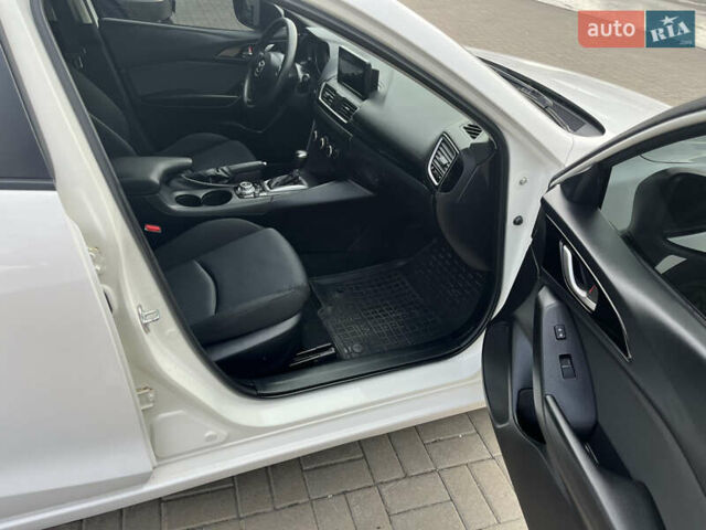 Білий Мазда 3, об'ємом двигуна 2 л та пробігом 175 тис. км за 10700 $, фото 14 на Automoto.ua