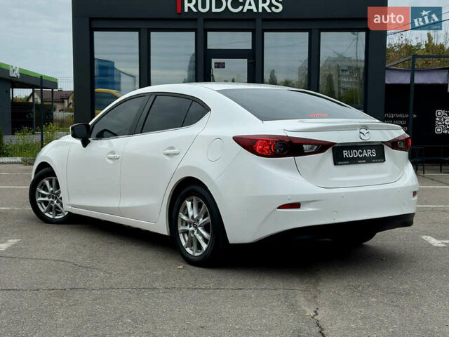 Белый Мазда 3, объемом двигателя 2 л и пробегом 208 тыс. км за 8899 $, фото 3 на Automoto.ua