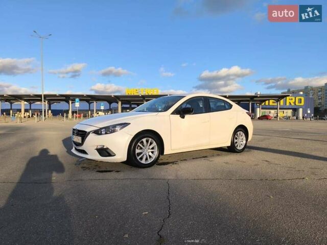 Белый Мазда 3, объемом двигателя 2 л и пробегом 160 тыс. км за 8600 $, фото 1 на Automoto.ua