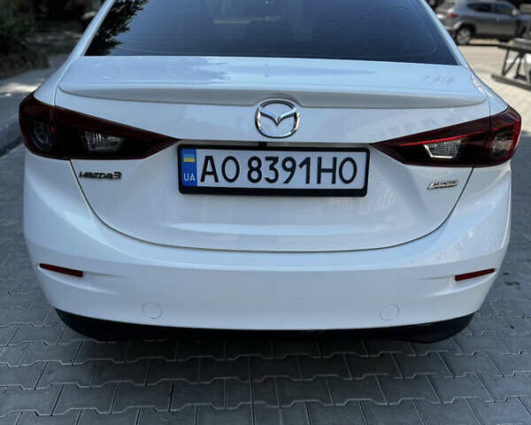 Белый Мазда 3, объемом двигателя 2 л и пробегом 132 тыс. км за 12000 $, фото 4 на Automoto.ua