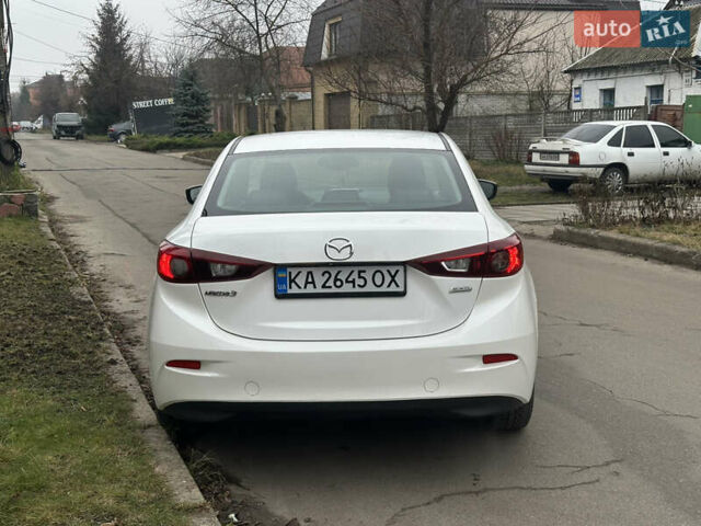Белый Мазда 3, объемом двигателя 2 л и пробегом 173 тыс. км за 8700 $, фото 8 на Automoto.ua