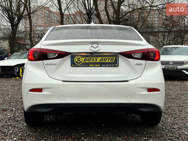 Белый Мазда 3, объемом двигателя 2 л и пробегом 119 тыс. км за 12650 $, фото 4 на Automoto.ua