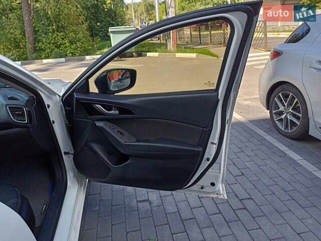 Белый Мазда 3, объемом двигателя 2 л и пробегом 174 тыс. км за 9600 $, фото 9 на Automoto.ua