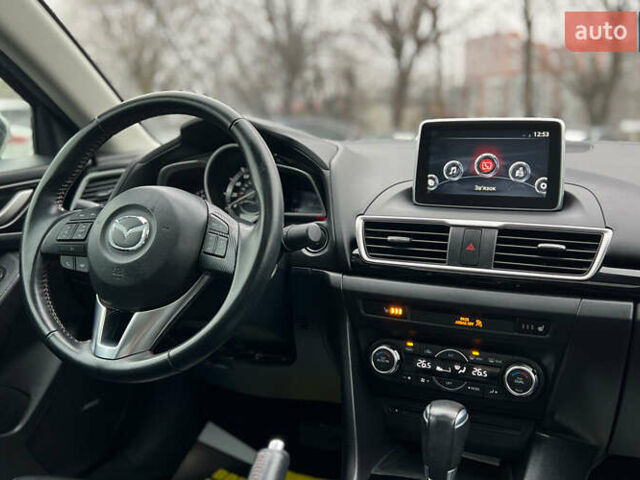 Белый Мазда 3, объемом двигателя 2 л и пробегом 119 тыс. км за 12650 $, фото 18 на Automoto.ua