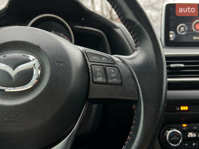 Белый Мазда 3, объемом двигателя 2 л и пробегом 119 тыс. км за 12650 $, фото 9 на Automoto.ua