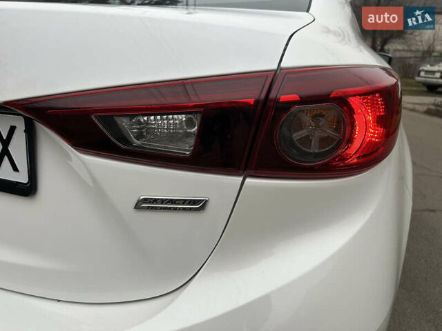 Белый Мазда 3, объемом двигателя 2 л и пробегом 173 тыс. км за 8700 $, фото 13 на Automoto.ua