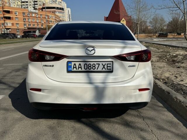 Белый Мазда 3, объемом двигателя 1.5 л и пробегом 80 тыс. км за 10800 $, фото 1 на Automoto.ua