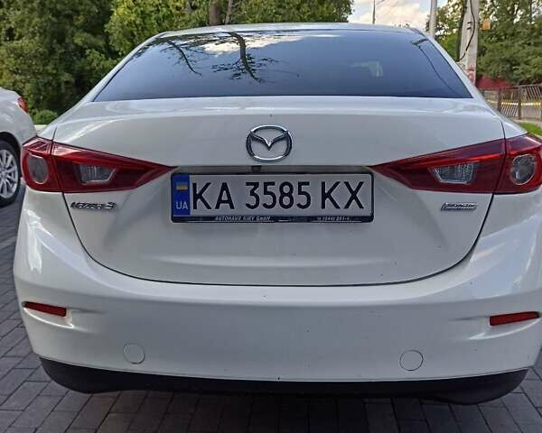 Белый Мазда 3, объемом двигателя 2 л и пробегом 174 тыс. км за 9600 $, фото 2 на Automoto.ua
