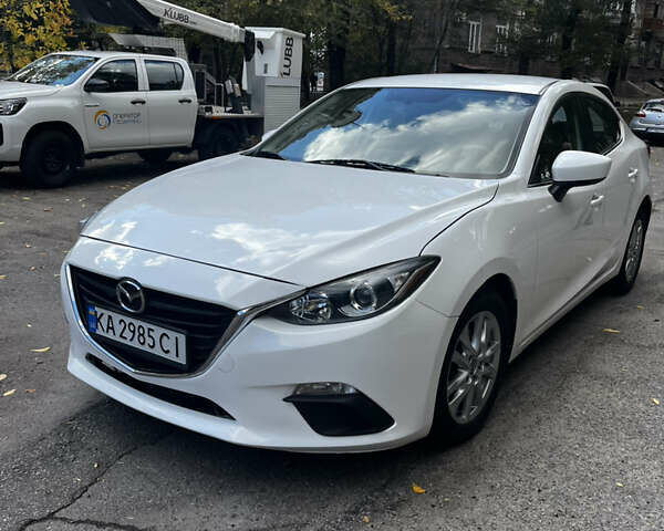 Белый Мазда 3, объемом двигателя 2 л и пробегом 211 тыс. км за 9300 $, фото 1 на Automoto.ua