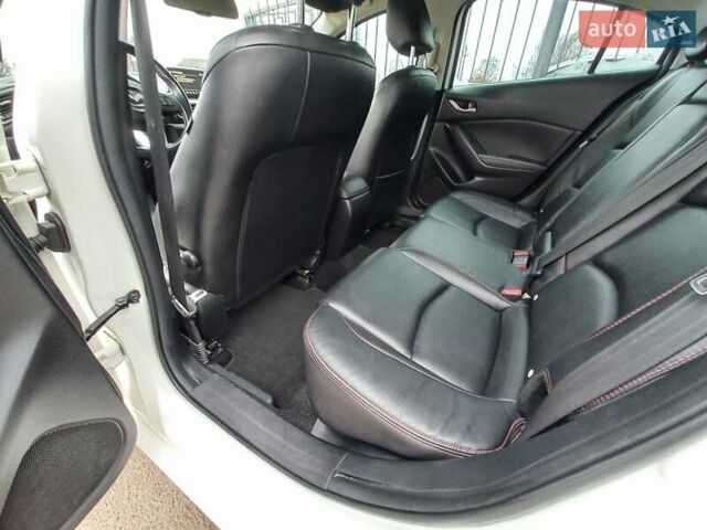 Білий Мазда 3, об'ємом двигуна 2 л та пробігом 147 тис. км за 11500 $, фото 18 на Automoto.ua