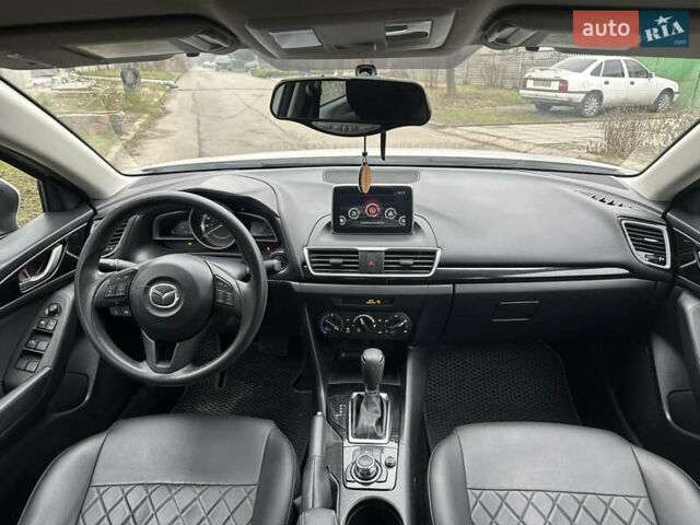 Белый Мазда 3, объемом двигателя 2 л и пробегом 173 тыс. км за 8700 $, фото 24 на Automoto.ua