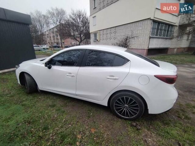 Белый Мазда 3, объемом двигателя 1.5 л и пробегом 168 тыс. км за 8999 $, фото 6 на Automoto.ua