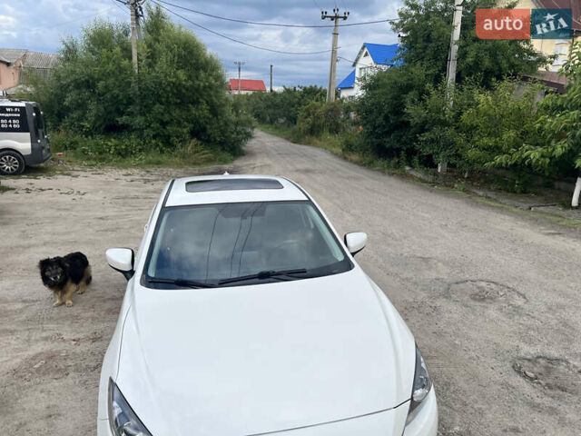 Белый Мазда 3, объемом двигателя 2 л и пробегом 204 тыс. км за 10500 $, фото 3 на Automoto.ua