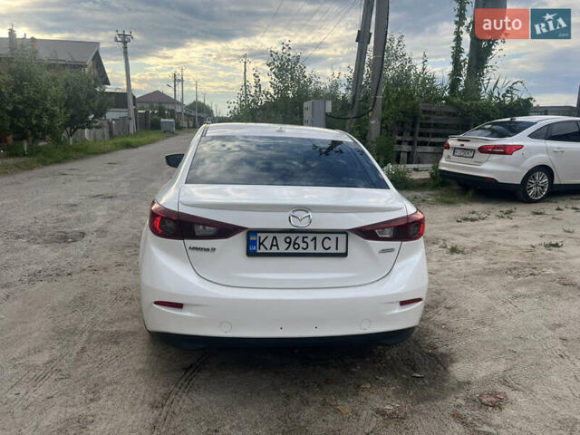 Белый Мазда 3, объемом двигателя 2 л и пробегом 204 тыс. км за 10500 $, фото 2 на Automoto.ua