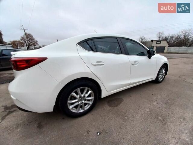 Білий Мазда 3, об'ємом двигуна 2 л та пробігом 147 тис. км за 11500 $, фото 9 на Automoto.ua