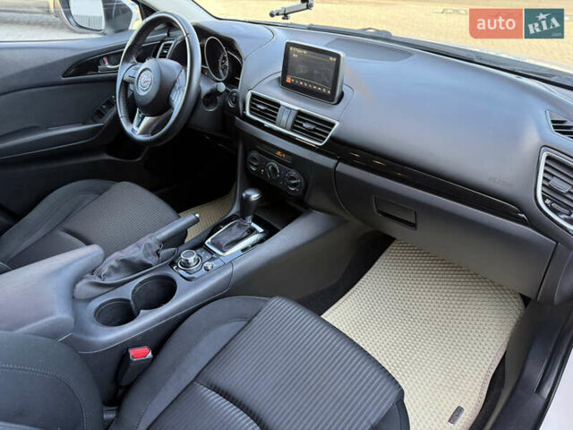 Белый Мазда 3, объемом двигателя 2 л и пробегом 114 тыс. км за 10900 $, фото 22 на Automoto.ua