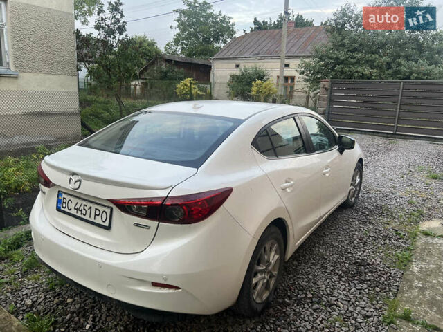 Білий Мазда 3, об'ємом двигуна 2 л та пробігом 149 тис. км за 10400 $, фото 2 на Automoto.ua