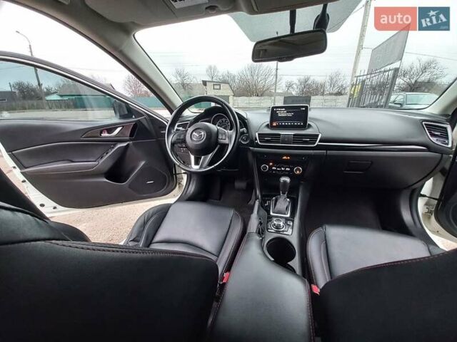 Білий Мазда 3, об'ємом двигуна 2 л та пробігом 147 тис. км за 11500 $, фото 15 на Automoto.ua