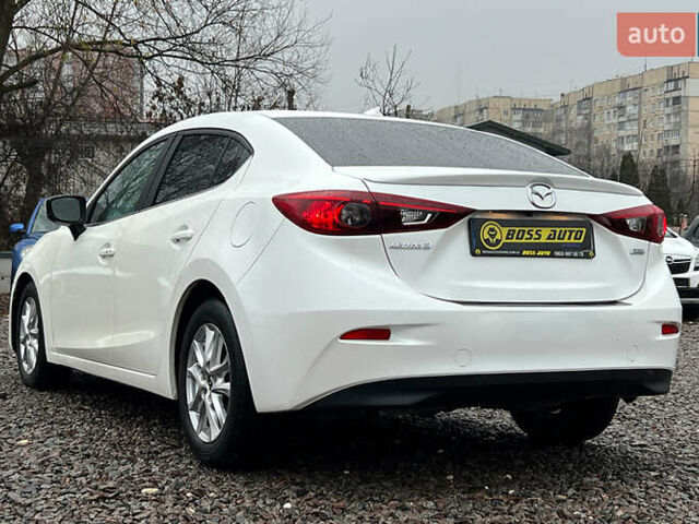 Белый Мазда 3, объемом двигателя 2 л и пробегом 119 тыс. км за 12650 $, фото 3 на Automoto.ua