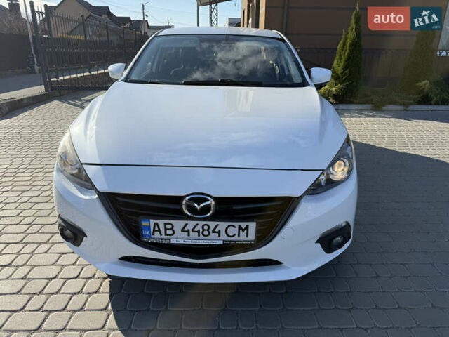 Белый Мазда 3, объемом двигателя 2 л и пробегом 114 тыс. км за 10900 $, фото 3 на Automoto.ua