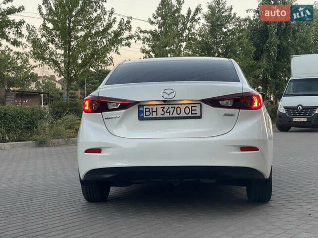 Белый Мазда 3, объемом двигателя 2 л и пробегом 200 тыс. км за 10500 $, фото 9 на Automoto.ua