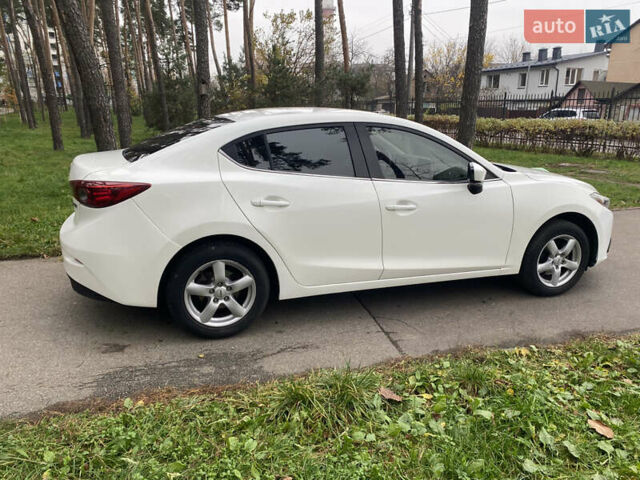 Білий Мазда 3, об'ємом двигуна 2 л та пробігом 175 тис. км за 9000 $, фото 8 на Automoto.ua