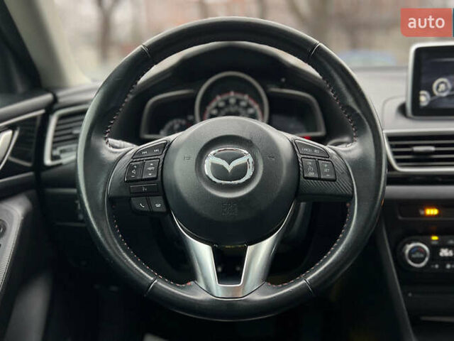 Белый Мазда 3, объемом двигателя 2 л и пробегом 119 тыс. км за 12650 $, фото 7 на Automoto.ua
