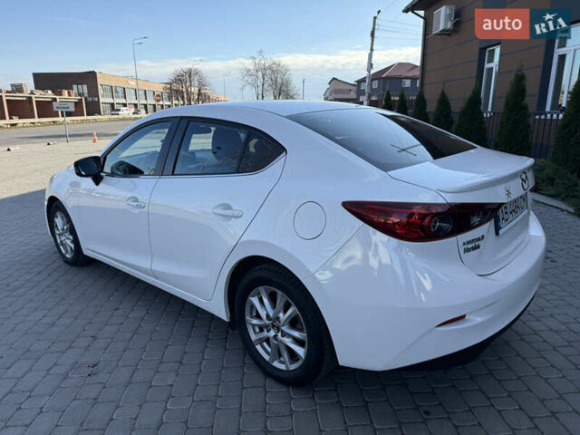 Белый Мазда 3, объемом двигателя 2 л и пробегом 114 тыс. км за 10900 $, фото 9 на Automoto.ua