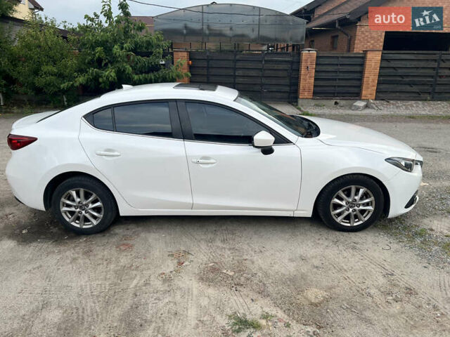 Белый Мазда 3, объемом двигателя 2 л и пробегом 204 тыс. км за 10500 $, фото 5 на Automoto.ua
