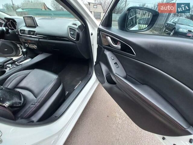 Білий Мазда 3, об'ємом двигуна 2 л та пробігом 147 тис. км за 11500 $, фото 17 на Automoto.ua