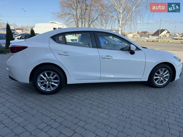 Белый Мазда 3, объемом двигателя 2 л и пробегом 114 тыс. км за 10900 $, фото 10 на Automoto.ua