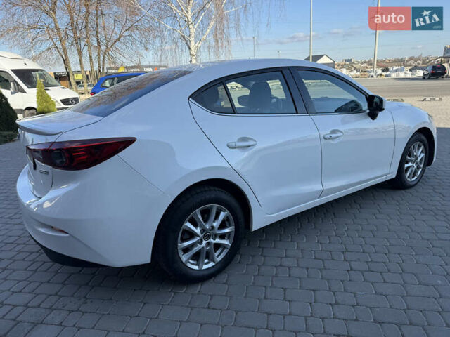 Белый Мазда 3, объемом двигателя 2 л и пробегом 114 тыс. км за 10900 $, фото 5 на Automoto.ua