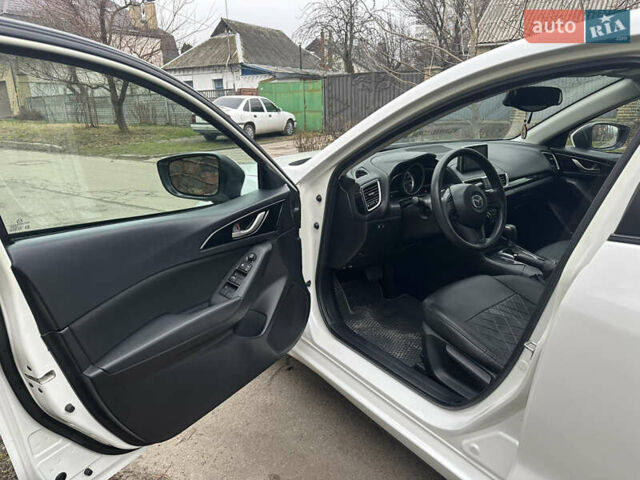 Белый Мазда 3, объемом двигателя 2 л и пробегом 173 тыс. км за 8700 $, фото 15 на Automoto.ua